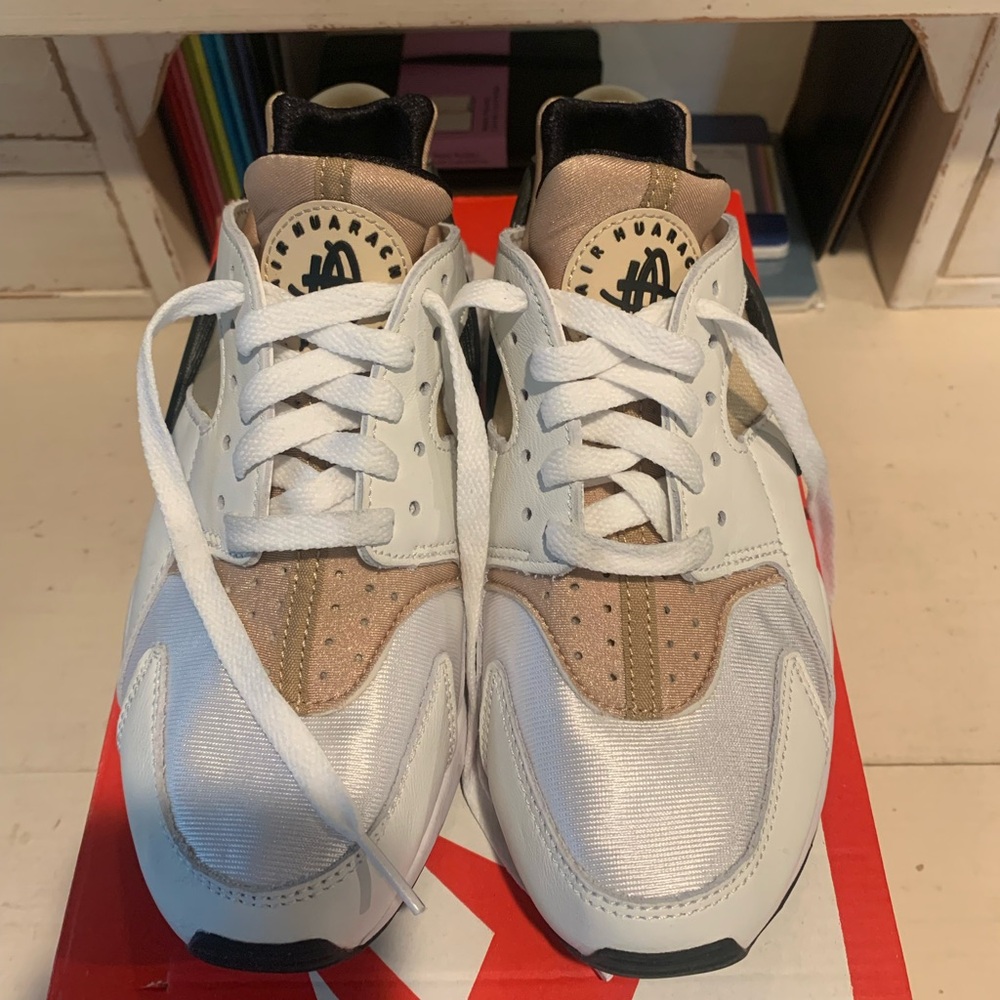 Nike Gold, Black, and White Athletic Huarache sneakers